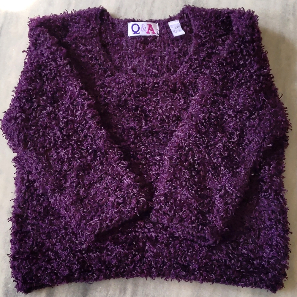 NWOT. Junior Fluffy scoop neck sweater with 3/4 sleeve.